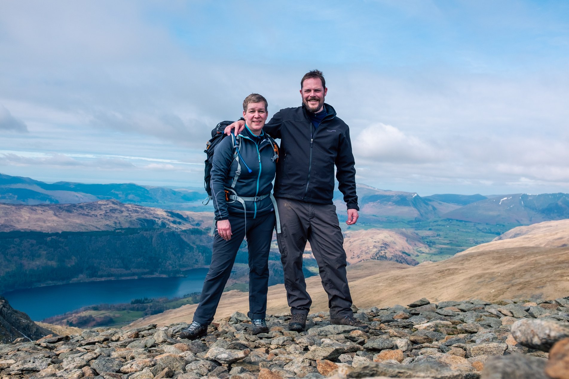 2 hikers on the summit of helvellyn