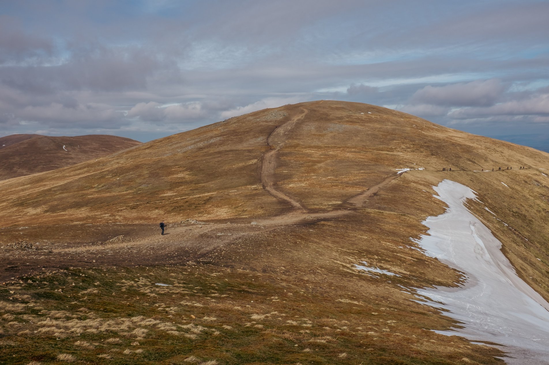 mountain path with some snow