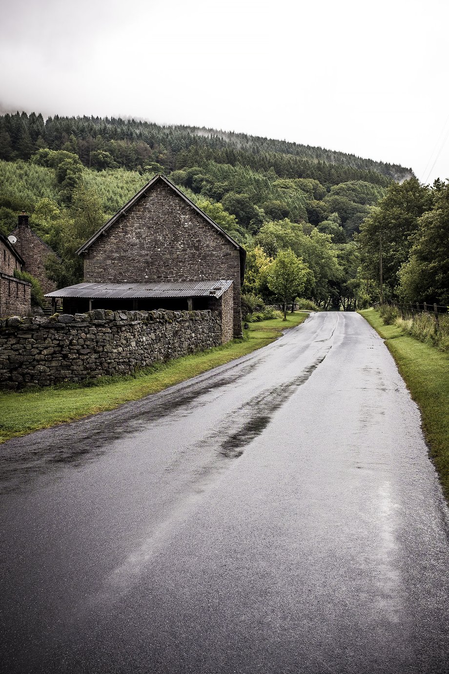 view along rural road with hills