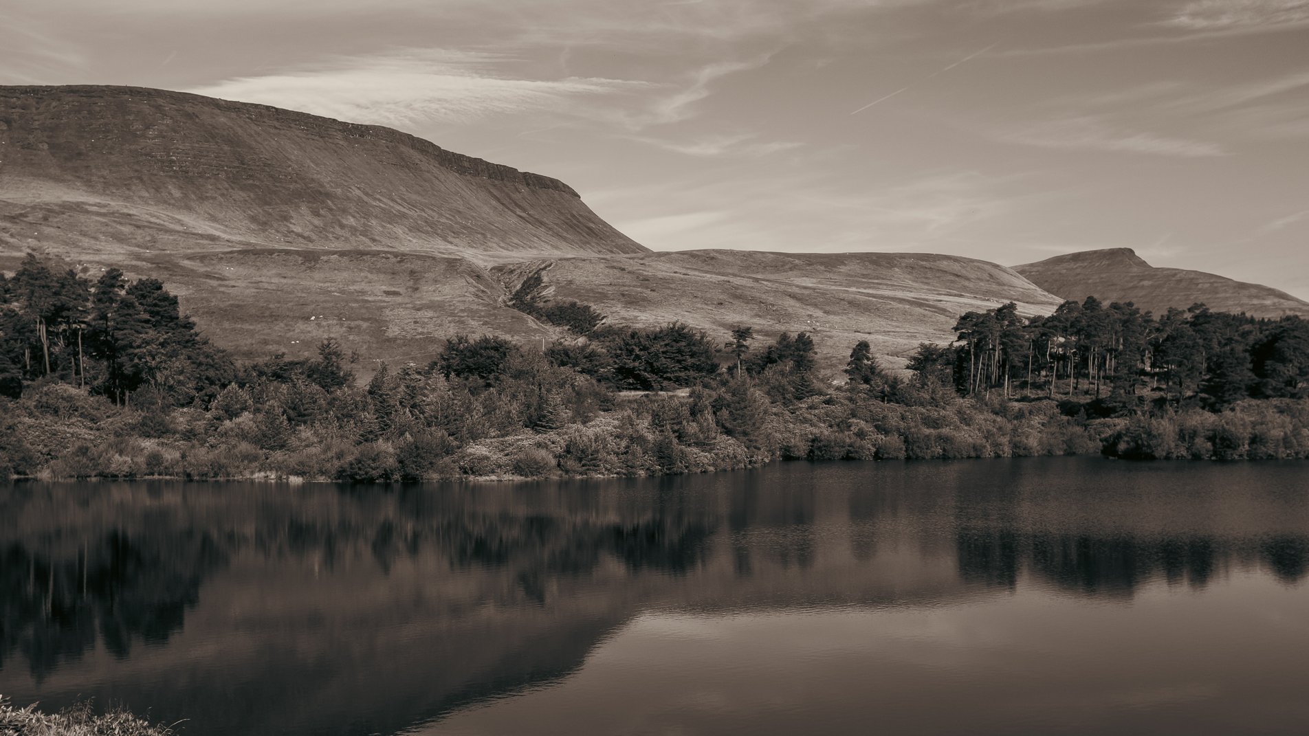 mountain landscape with reservoir in foreground