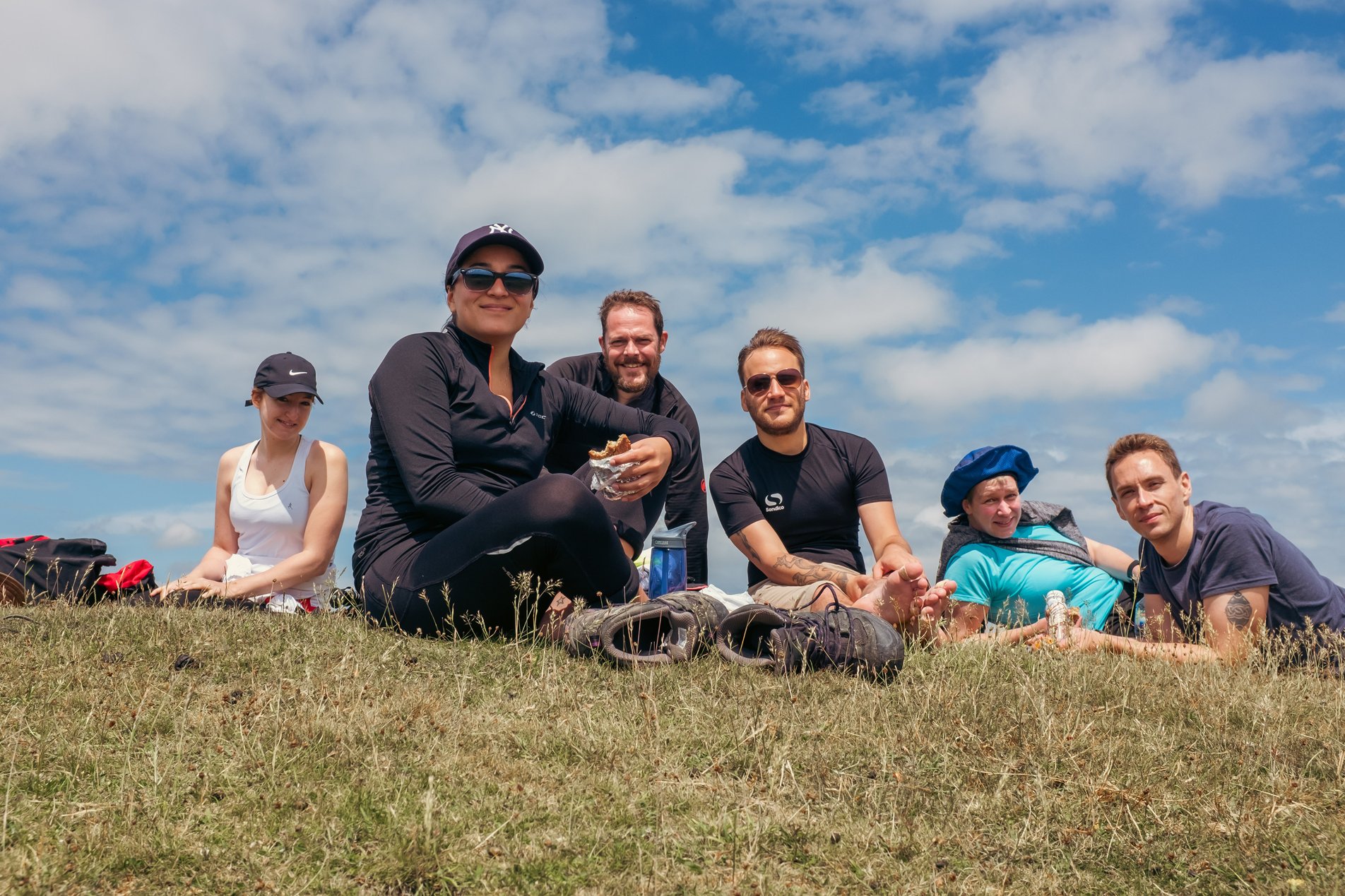 group of hikers eating lunch