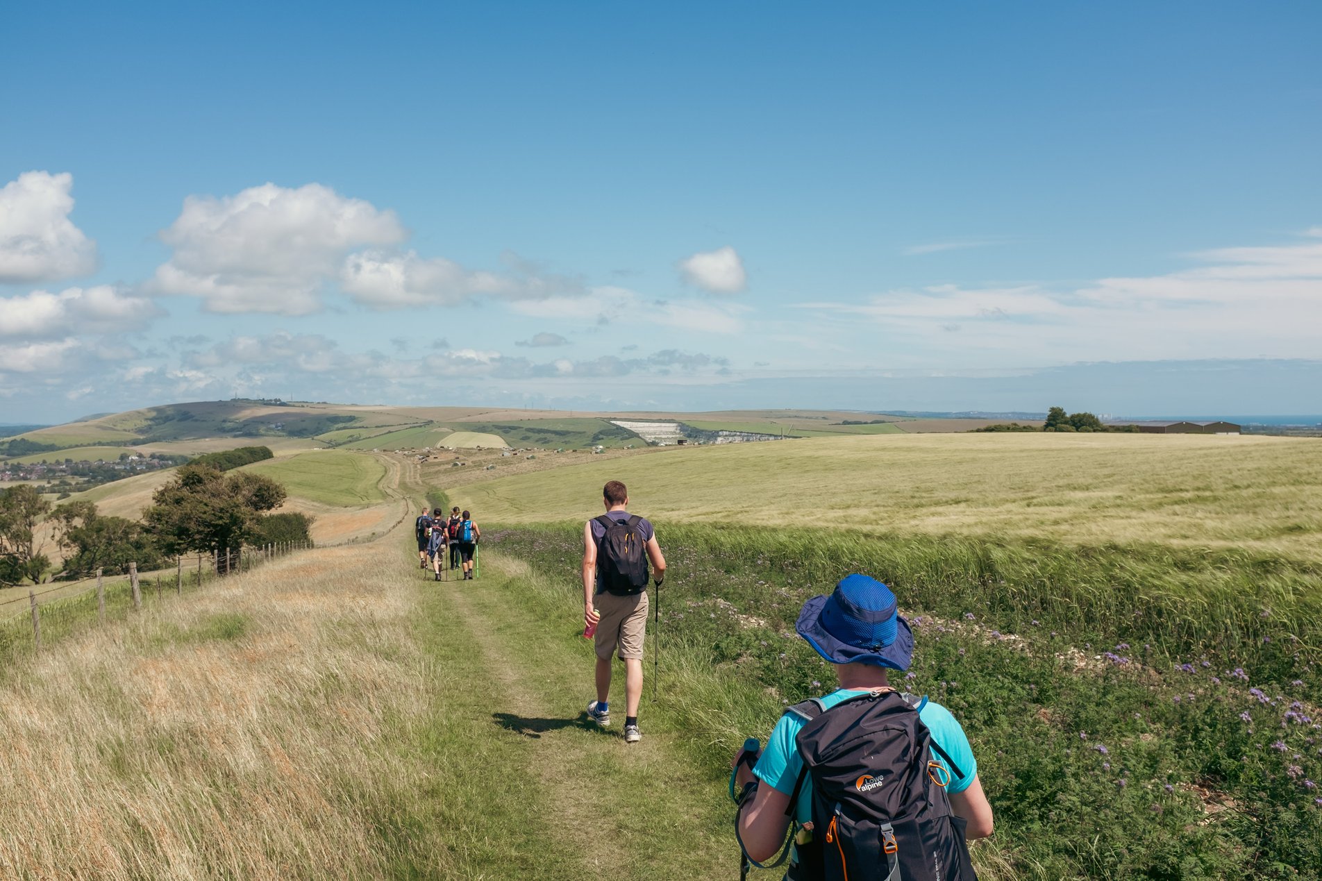group of hikers on footpath