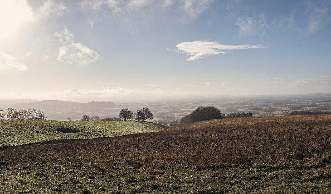 winter hillscape with clouds