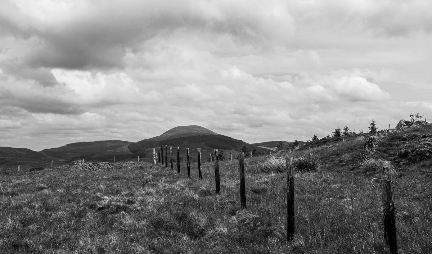 fence line in mountains
