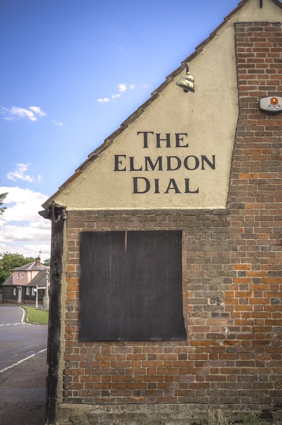 pub building with the sign-written name 'the elmdon dial'