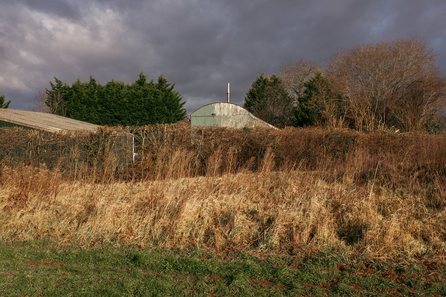 field with barn