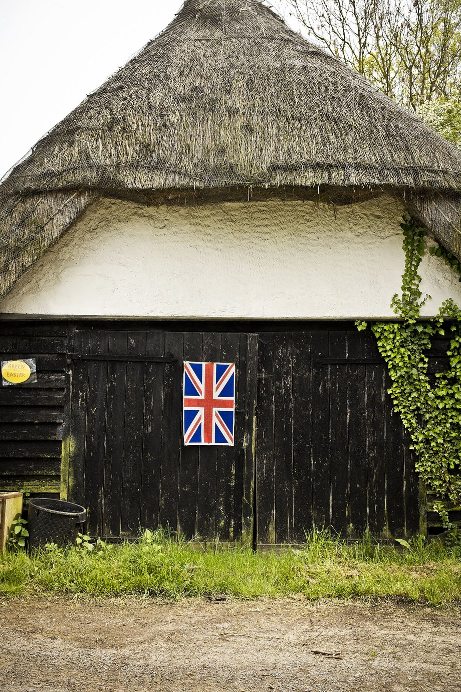 barn with union flag on door