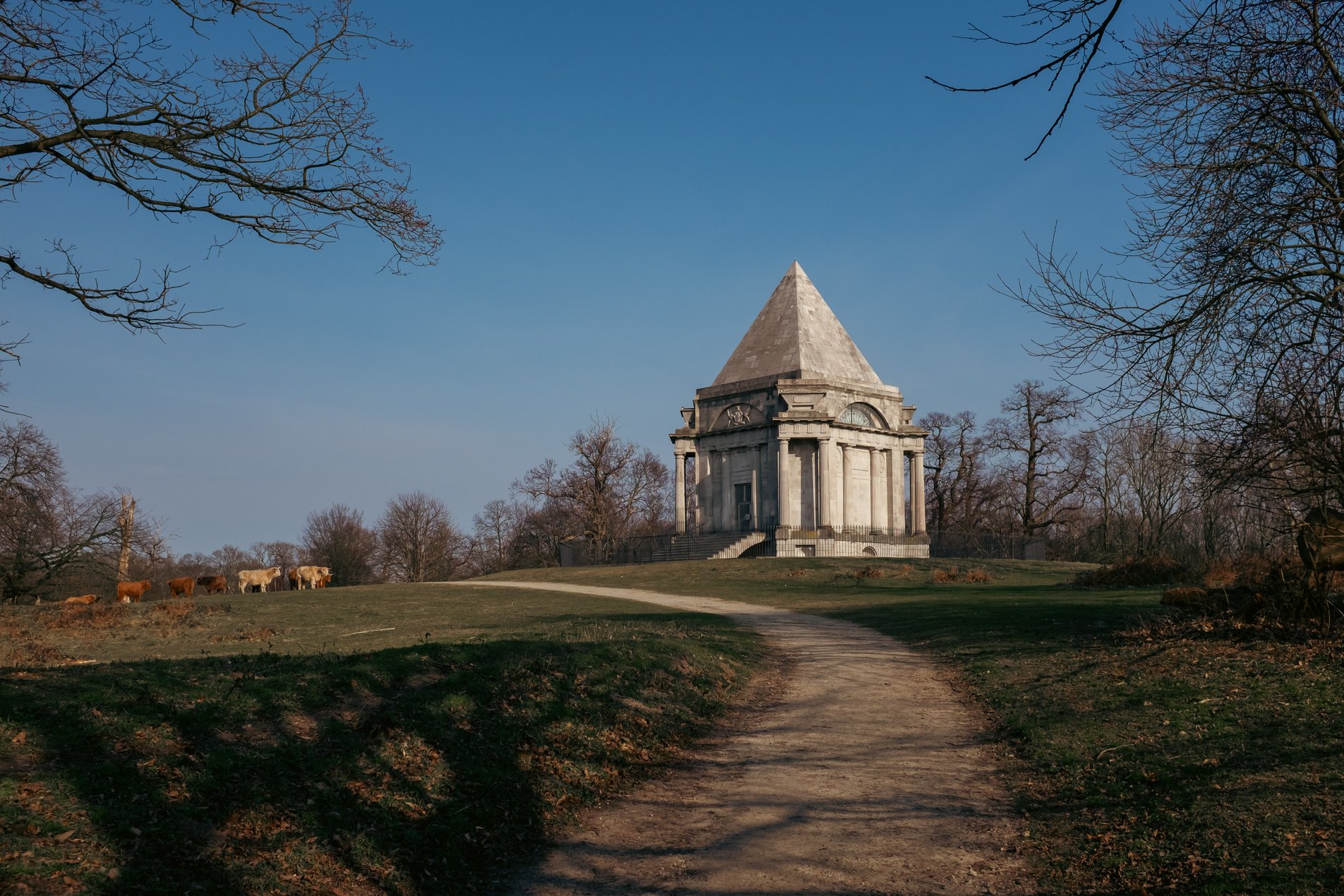 path up to mausoleum with cattle