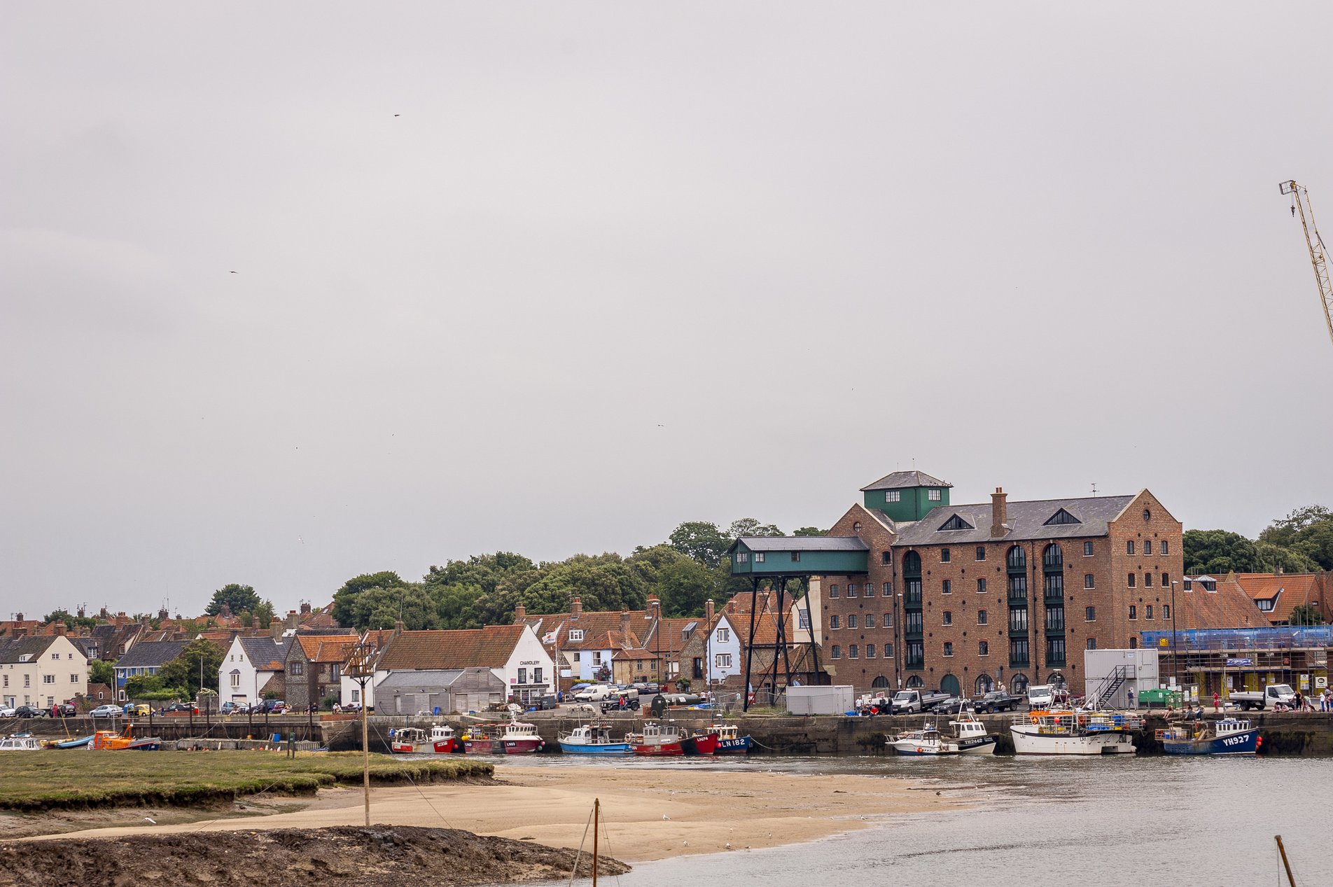 industrial granary building with wooden gantry in wells harbour