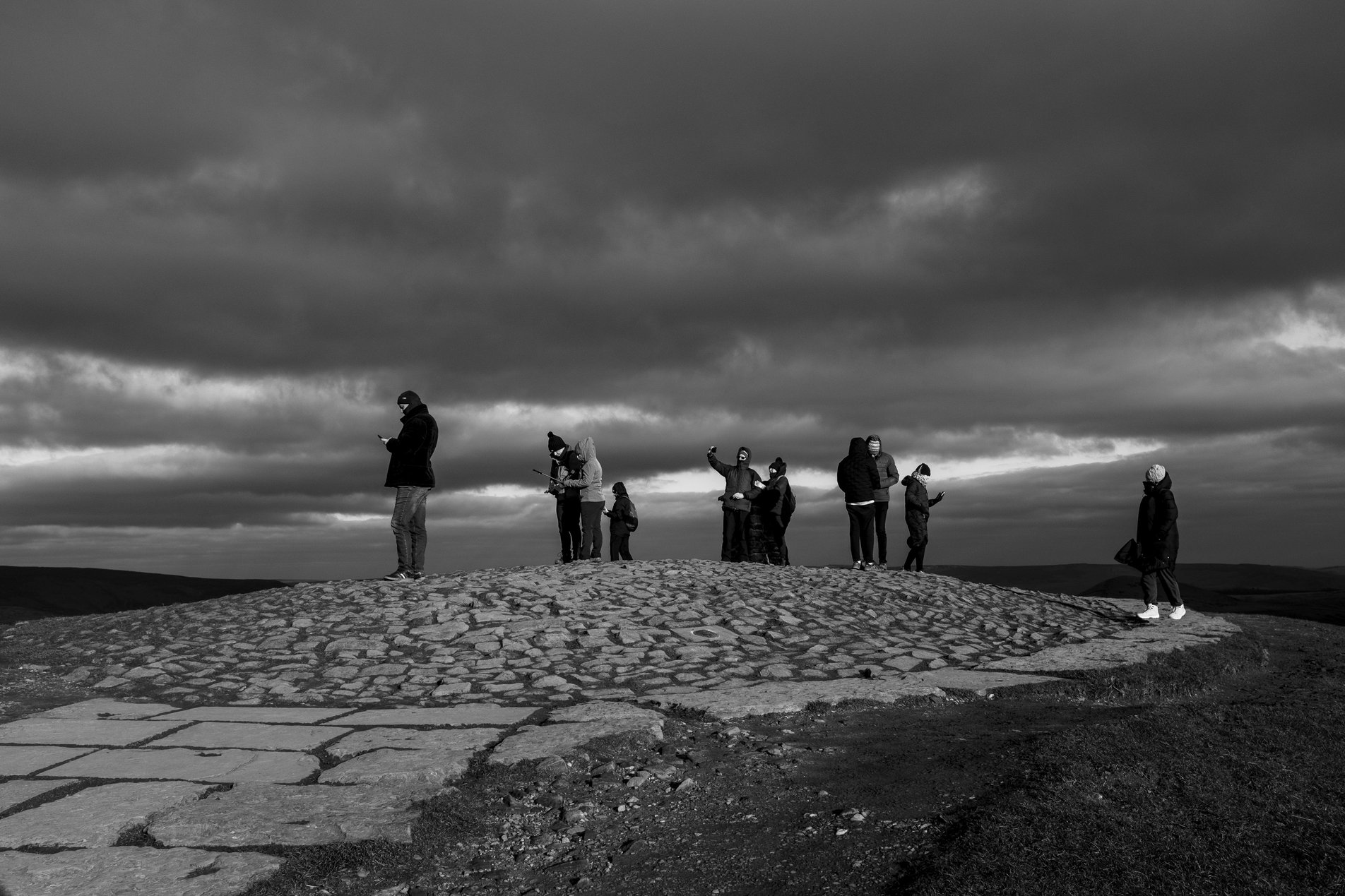 people on the summit of mam tor