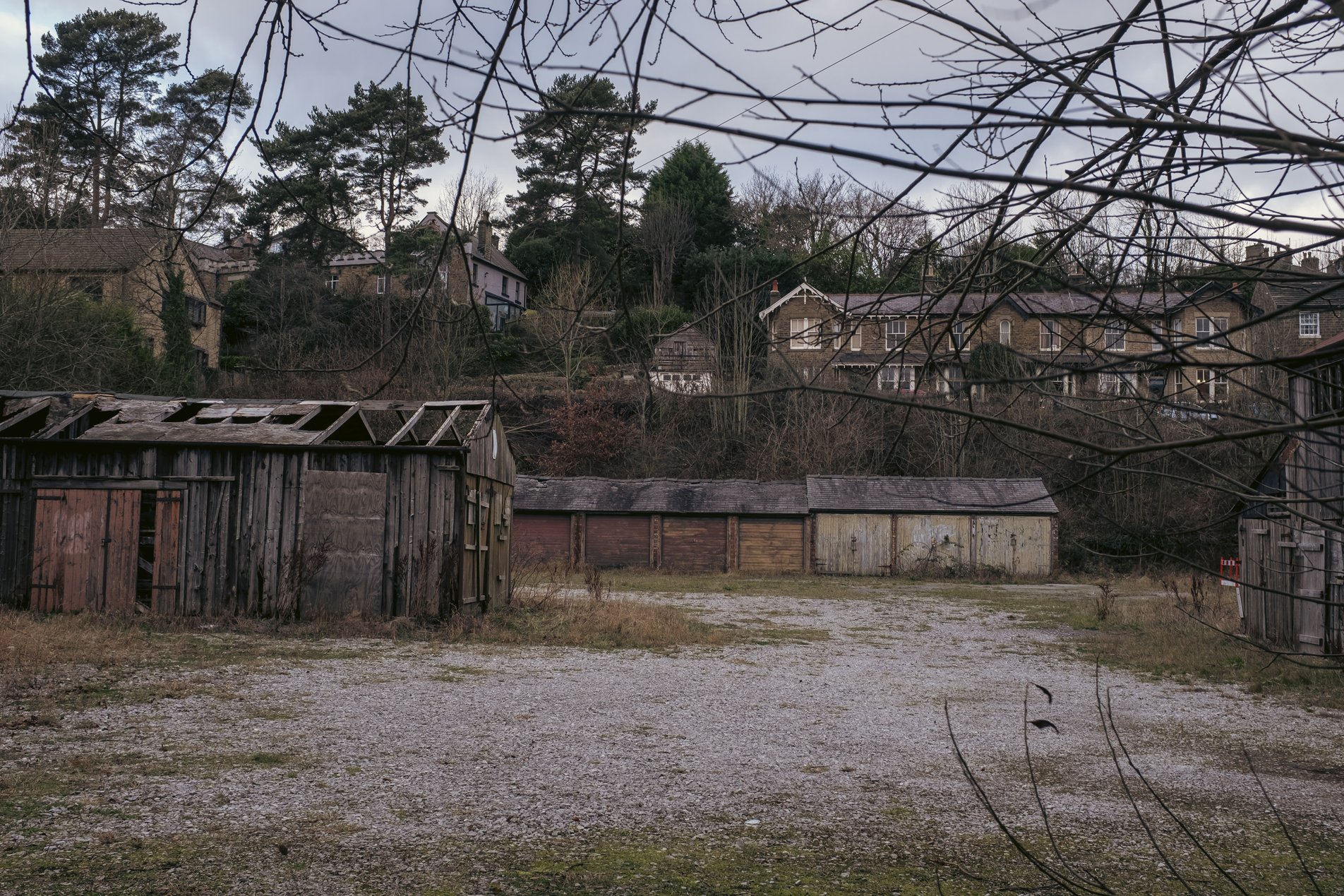 lock up garages in yard with houses behind