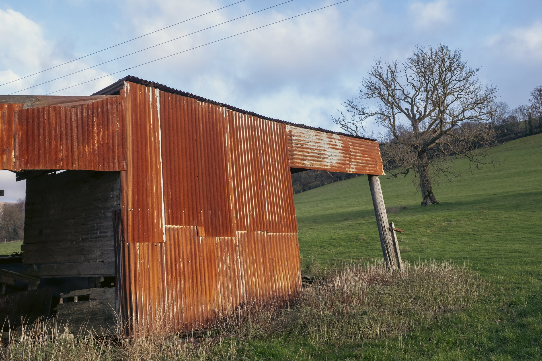 rusty orange corrugated iron barn