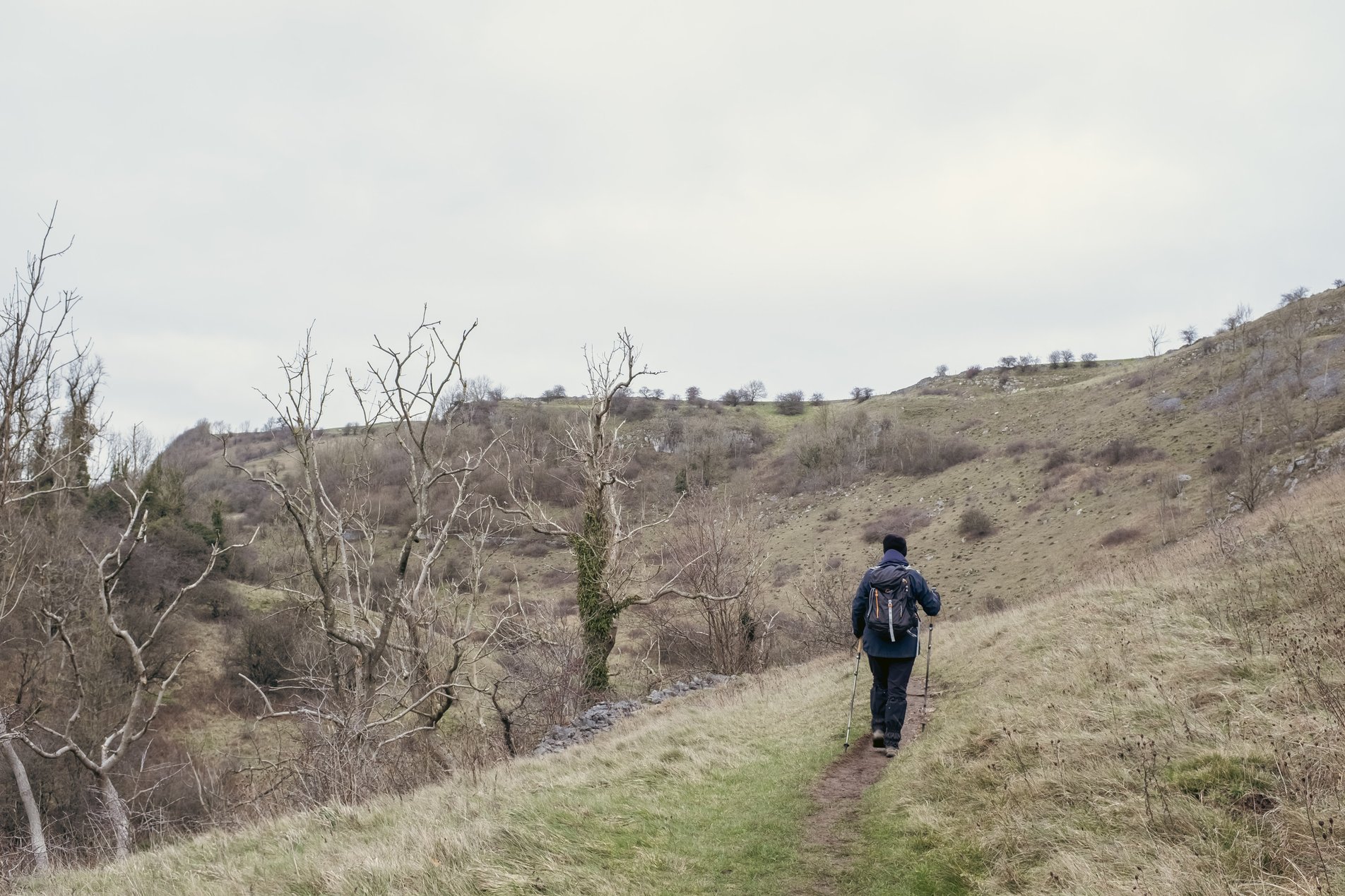 hiker in peak district landscape