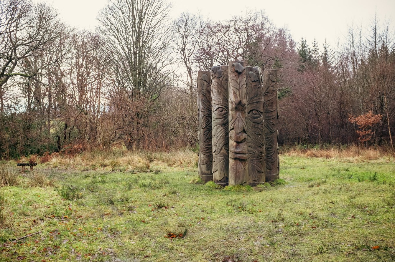 The Green Man, made of logs depicting a face, by local artist Phil Townsend
