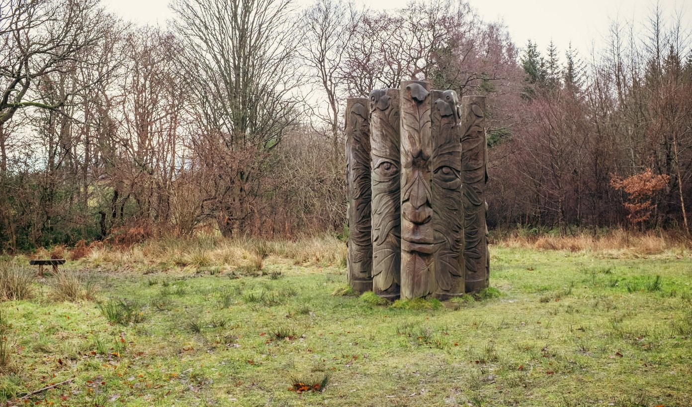 the green man, made of logs depicting a face, by local artist phil townsend