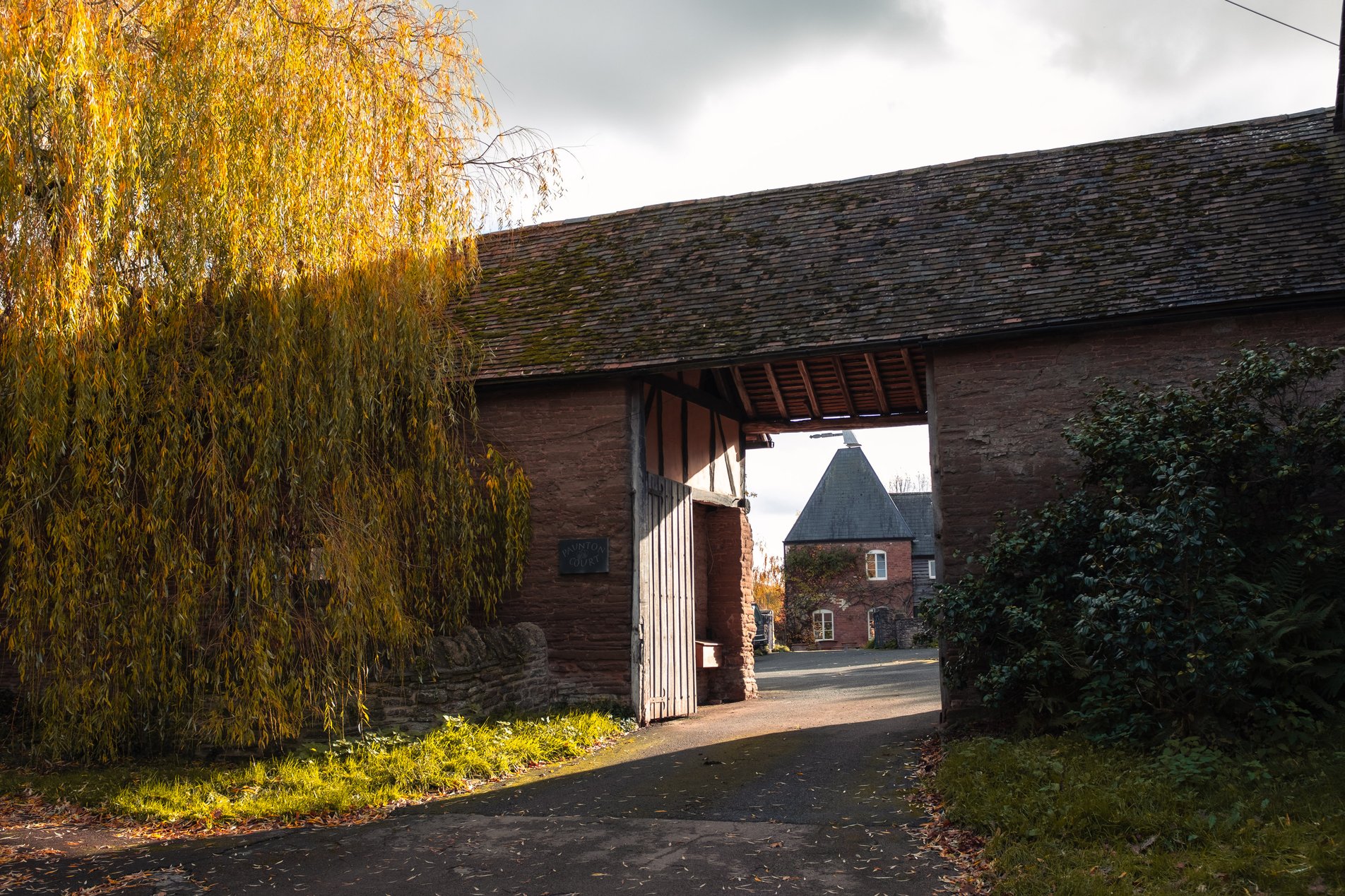 view into couryard with oasthouse