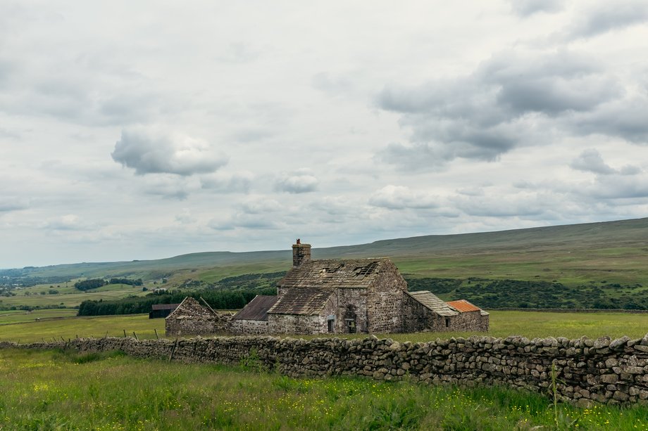 derelict farmhouse on moorland